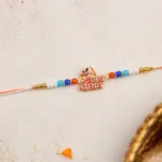 Lord Ram Designer Rakhi with Colorful Beads (1 Pc) - Image 2