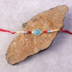 Evil Eye Designer Rakhi with Multicolor Beads (1 Pc) - Image 3