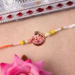 Ganesh Ji Designer Rakhi with Yellow Beads (1 Pc) - Image 2
