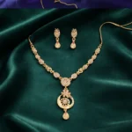 Stylish Gold-Tone Circular Pendant Necklace Set with Floral Accent & Matching Earrings - Image 2