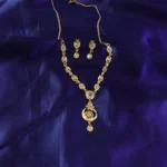Stylish Gold-Tone Circular Pendant Necklace Set with Floral Accent & Matching Earrings - Image 3